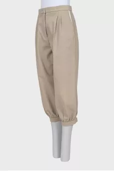 Cropped trousers with buttons
