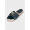 Leather flip flops with rhinestones on the logo