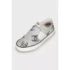White leather sneakers with print
