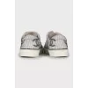 White leather sneakers with print
