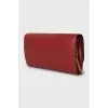 Red leather clutch