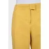 Cropped trousers in yellow