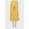 Cropped trousers in yellow