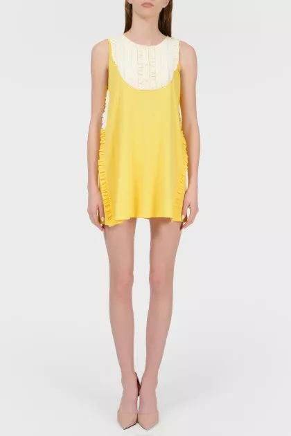 Sleeveless mini dress with tag