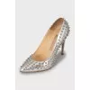 Silver shoes with spikes