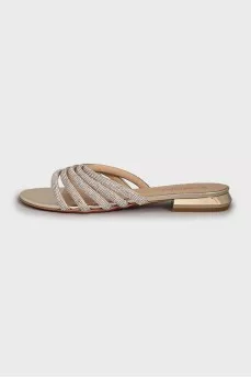 Leather flip flops decorated with rhinestones