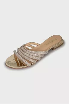 Leather flip flops decorated with rhinestones
