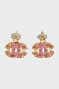 Earrings in the form of a company logo