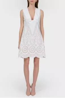 Dress with a deep neckline in a perforation with a tag