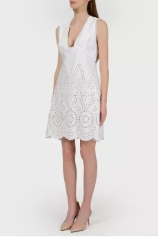 Dress with a deep neckline in a perforation with a tag