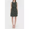 Flower -free dress with an open back with a tag