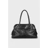 Shoulder bag with embossed leather