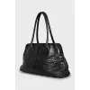 Shoulder bag with embossed leather