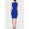 Laconic dress with a drapery and a tag