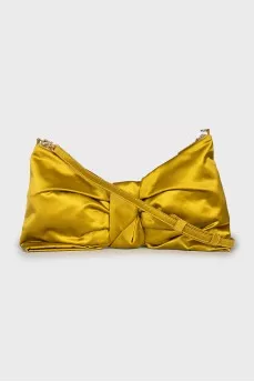 Textile bag in the form of a bow