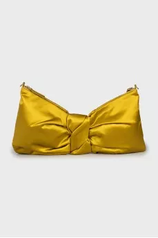 Textile bag in the form of a bow