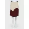 Light skirt with burgundy inserts