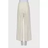 Straight trousers with high waist