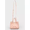 Powder bag with eyelets