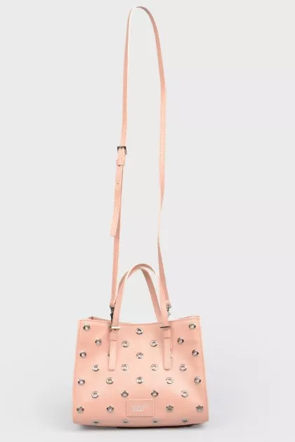 Powder bag with eyelets