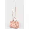 Powder bag with eyelets