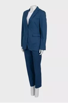 Suit with blue trousers