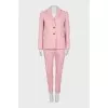 Trouser suit with accent buttons