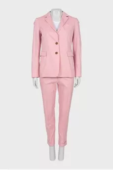 Trouser suit with accent buttons