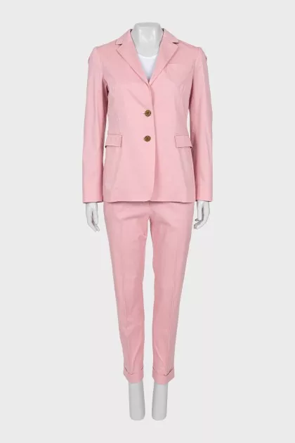 Trouser suit with accent buttons
