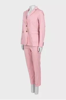 Trouser suit with accent buttons