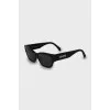 Sunglasses with branded temples