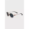 Oval sunglasses with gold frame