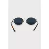 Oval sunglasses with gold frame