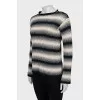 Sweater with buttons on the shoulder