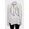 Silk blouse decorated with chain