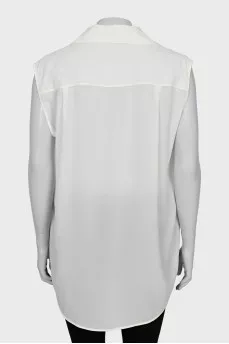 Silk blouse decorated with chain