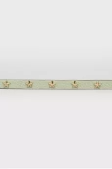 Salad leather belt with golden spikes with a tag