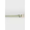 Salad leather belt with golden spikes with a tag