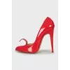 Red shoes with a figured cutout
