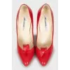 Red shoes with a figured cutout