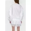 White blouse with voluminous sleeves with a tag