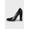 Black patent leather pointed toe shoes