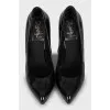 Black patent leather pointed toe shoes