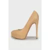 Leather high heels with gold trim