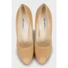 Leather high heels with gold trim