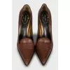 Leather shoes decorated with stitching