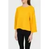Jumper with shortened sleeves with cuts with a tag