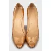 Gold colored open toe shoes