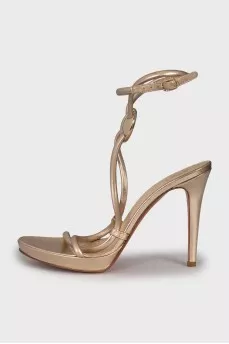 Gold leather stiletto heeled sandals