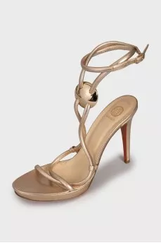 Gold leather stiletto heeled sandals